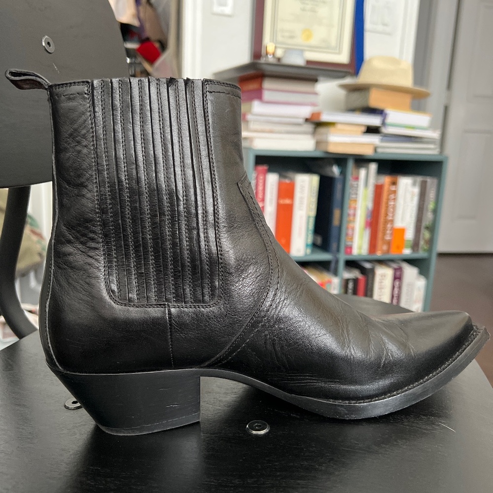 Black leather boots by SAINT LAURENT